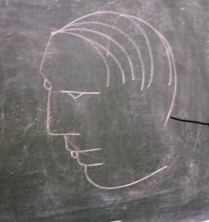 Hombre en la pizarra